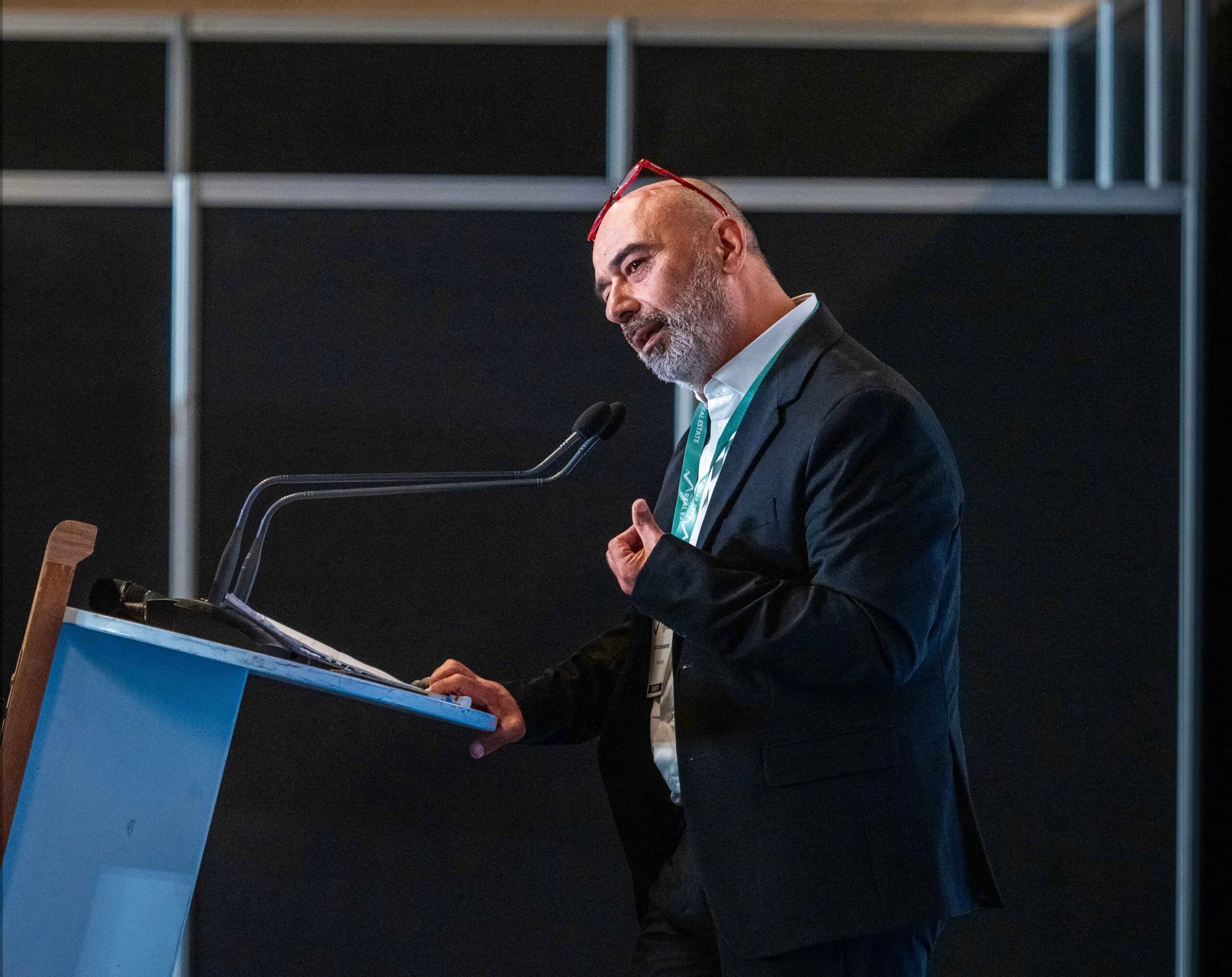 Kostas Arslanoğlu speaking at the 2024 Real Estate Investment Forum in Athens